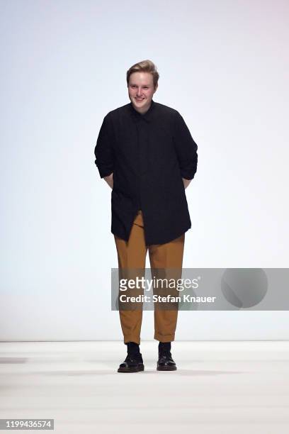 Designer Danny Reinke acknowledges the applause of the audience after his show during Berlin Fashion Week Autumn/Winter 2020 at Kraftwerk Mitte on...