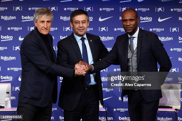 Barcelona President Josep Maria Bartomeu, Head Coach Quique Setien and Sporting Director Eric Abidal pose for the media as Quique Setien is unveiled...