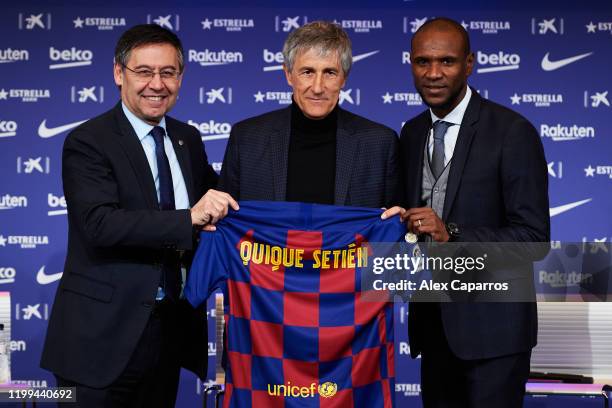Barcelona President Josep Maria Bartomeu, Head Coach Quique Setien and Sporting Director Eric Abidal pose for the media as Quique Setien is unveiled...