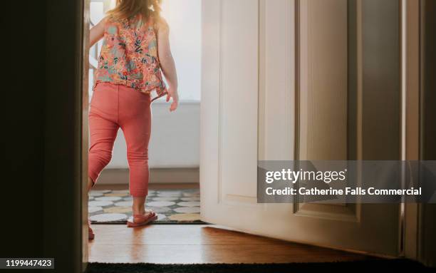 young girl in room - girl with legs open stock pictures, royalty-free photos & images