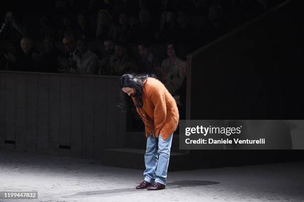 Fashion designer Alessandro Michele acknowledges the applause of the audience at the Gucci show during Milan Menswear Fashion Week Fall/Winter...