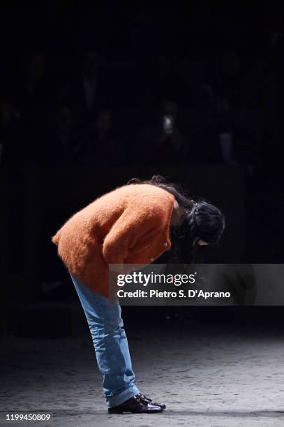 Fashion designer Alessandro Michele acknowledges the applause of the audience at the Gucci show during Milan Menswear Fashion Week Fall/Winter...