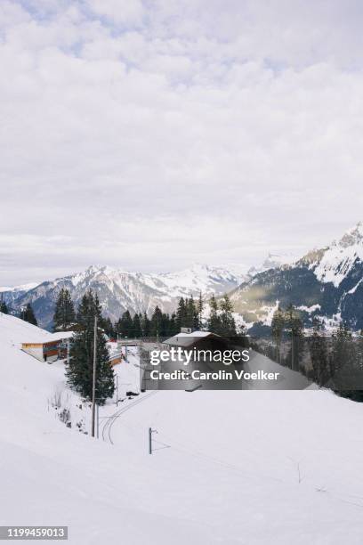 high angle view of a ski slope in the swiss alps close to murren, switzerland - summit station stock pictures, royalty-free photos & images