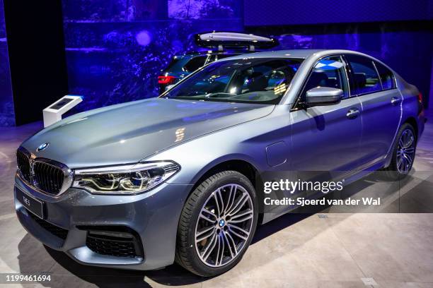 Series sedan on display at Brussels Expo on January 9, 2020 in Brussels, Belgium. The current generation of BMW 3 Series cars consists of the BMW G30...