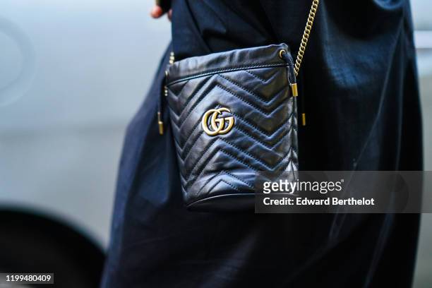 Gucci quilted bag with golden logo is seen, outside Reshake, during Milan Fashion Week Menswear Fall/Winter 2020/2021, on January 13, 2020 in Milan,...
