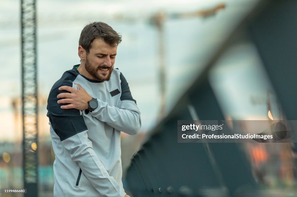 Handsome Young Sportsman Have Physical Injury of Shoulder During a Practice