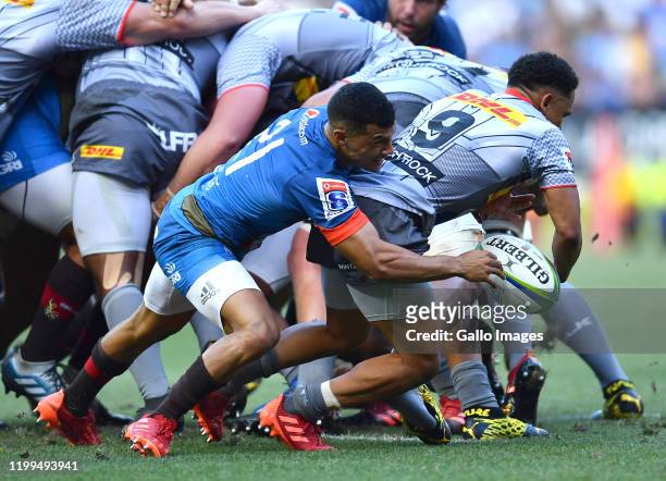 Herschel Jantjies of the Stormers tackled by Embrose Papier of the Bulls during the Super Rugby match between DHL Stormers and Vodacom Bulls at DHL...