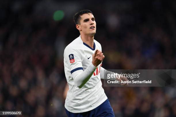 Erik Lamela of Tottenham Hotspur celebrates scoring his sides second goal during the FA Cup Third Round Replay match between Tottenham Hotspur and...