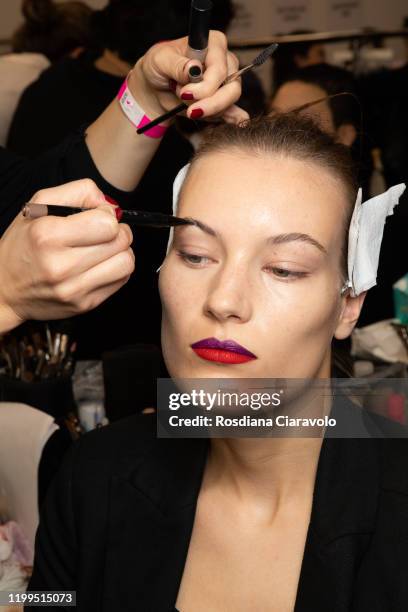 Model is seen backstage at the Miaoran fashion show on January 13, 2020 in Milan, Italy.