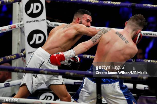 Anthony Tomlinson lands a big right hand on Stewart Burt during the Welterweight fight between Anthony Tomlinson and Stewart Burt at FlyDSA Arena on...