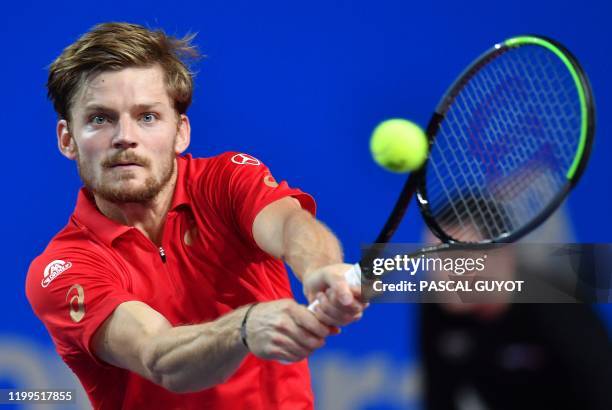 Belgium's David Goffin returns the ball to Canada's Vasek Pospisil during their semi final tennis match at the Open Sud de France ATP World Tour in...