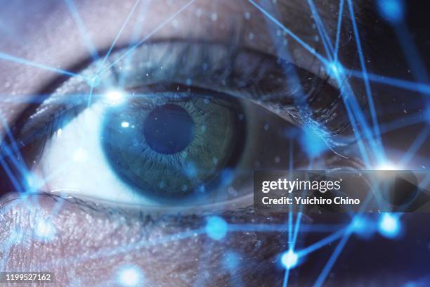 human eye and closeup network - eye close up iris photos et images de collection