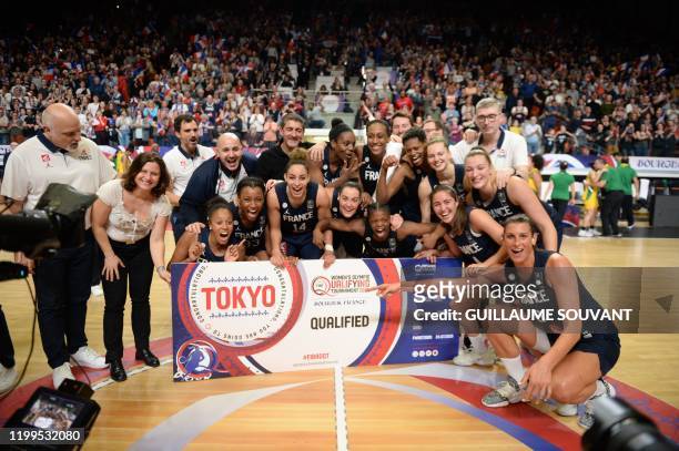 French Sports Minister Roxana Maracineanu and France players celebrate their win against Brazil in the FIBA Women's Olympic Qualifying Tournament...