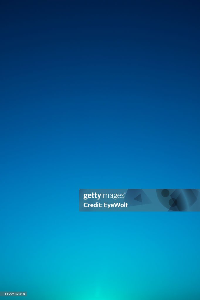 Abstract gradient from cyan to dark blue