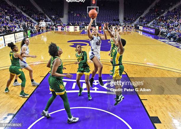 Christianna Carr of the Kansas State Wildcats puts up a shot against DiDi Richards of the Baylor Lady Bears during the second quarter on February 8,...