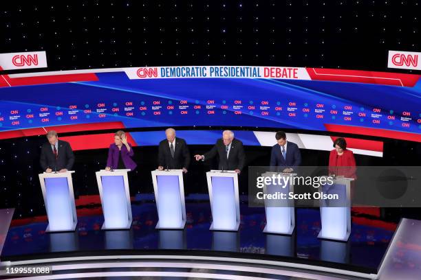 Tom Steyer , Sen. Elizabeth Warren , former Vice President Joe Biden, former South Bend, Indiana Mayor Pete Buttigieg and Sen. Amy Klobuchar listen...