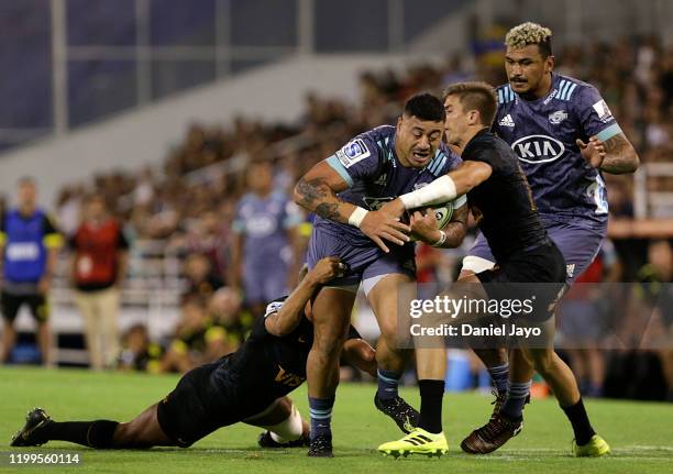 Ben Lam of Hurricanes is tackled during a match between Jaguares and Hurricanes as part of Super Rugby 2020 at Jose Amalfitani Stadium on February 8,...