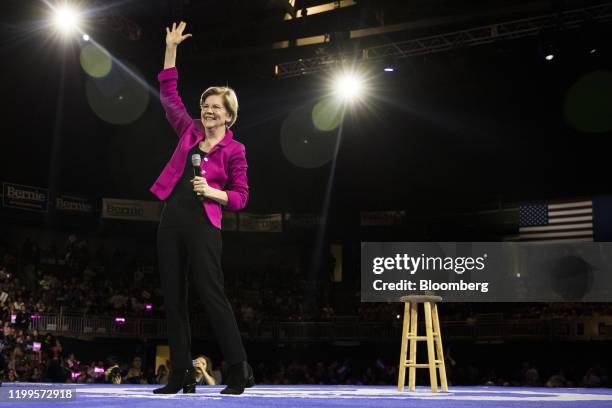 Senator Elizabeth Warren, a Democrat from Massachusetts and 2020 presidential candidate, waves as she speaks during the 61st Annual McIntyre-Shaheen...