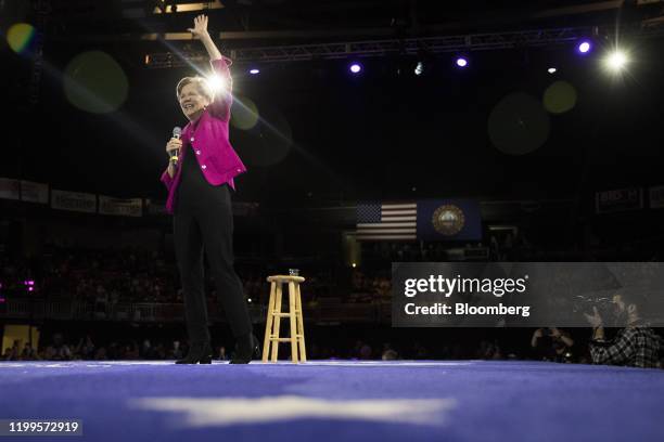 Senator Elizabeth Warren, a Democrat from Massachusetts and 2020 presidential candidate, waves as she speaks during the 61st Annual McIntyre-Shaheen...