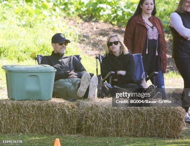 Jim Toth and Reese Witherspoon are seen on February 08, 2020 in Los Angeles, California.