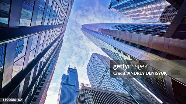 conceptual view of corporate building. sky. skyline. financial district. - 銀行 財政大樓 個照片及圖片檔