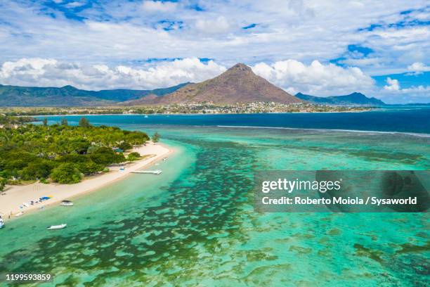 white sand beach by tropical lagoon, flic en flac, mauritius - mauritius stock pictures, royalty-free photos & images