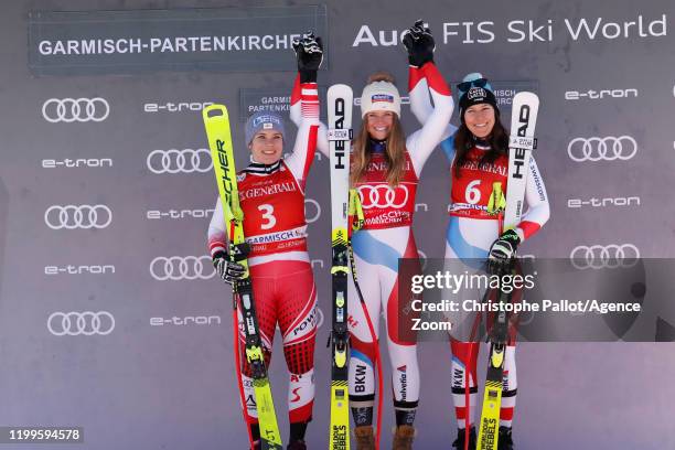 Nicole Schmidhofer of Austria takes 2nd place, Corinne Suter of Switzerland takes 1st place, Wendy Holdener of Switzerland takes 3rd place during the...