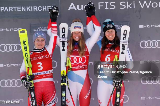 Nicole Schmidhofer of Austria takes 2nd place, Corinne Suter of Switzerland takes 1st place, Wendy Holdener of Switzerland takes 3rd place during the...