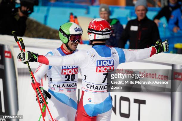 Loic Meillard of Switzerland celebrates with Thomas Tumler of Switzerland during the Audi FIS Alpine Ski World Cup Men's Parallel Giant Slalom on...