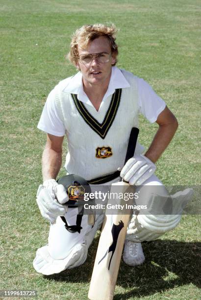 Australia batsman Dirk Whellham pictured wearing spectacles in his Australia kit holding his Slazenger cricket bat and helmet in 1982 in Australia.
