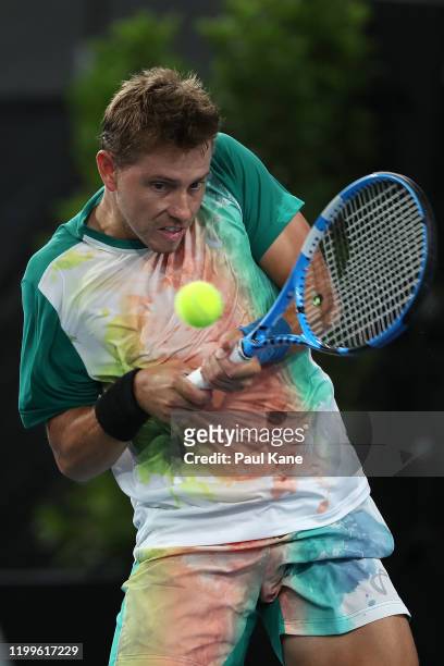 James Duckworth of Australia plays a backhand to Felix Auger-Aliassime of Canada during day four of the 2020 Adelaide International at Memorial Drive...