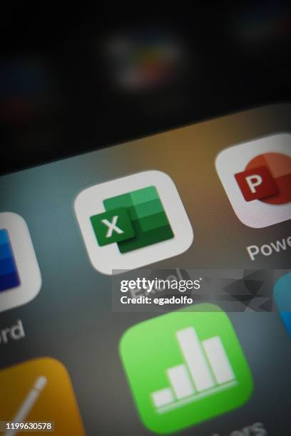 excel icon on smartphone - microsoft office stock pictures, royalty-free photos & images