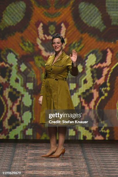 Designer Lena Hoschek acknowledges the applause of the audience after her show during Berlin Fashion Week Autumn/Winter 2020 at Kraftwerk Mitte on...