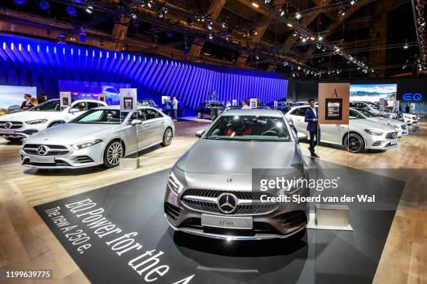 Mercedes-Benz motor show stand with the Mercedes-Benz A Class plug in hybrid A250e compact hatchback car on display at Brussels Expo on January 9,...