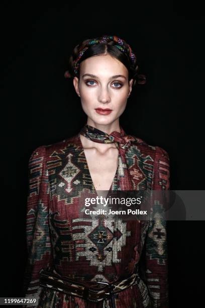 Model is seen backstage ahead of the Lena Hoschek show during Berlin Fashion Week Autumn/Winter 2020 at Kraftwerk Mitte on January 15, 2020 in...