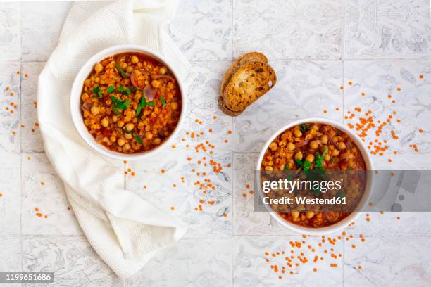 lentil and chickpea soup (red lentils, chickpeas, tomatoes, red onions, mint) - pea and mint soup stock pictures, royalty-free photos & images