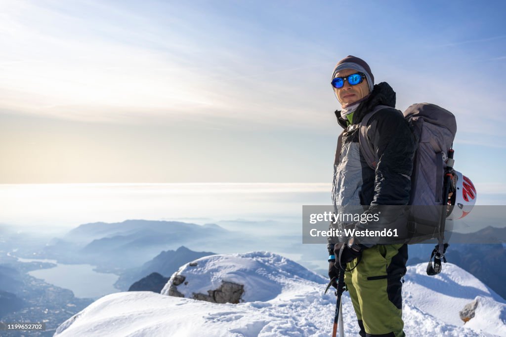 Alpine Person Portrait Of An Alpinist Standing On Snowy Mountain Peak Orobie Alps ...