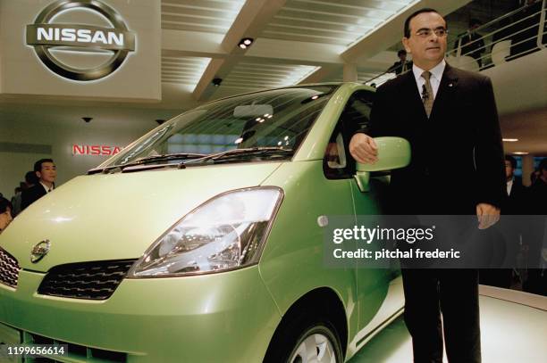 Carlos Ghosn PDG de Nissan au salon de l'automobile à Tokyo