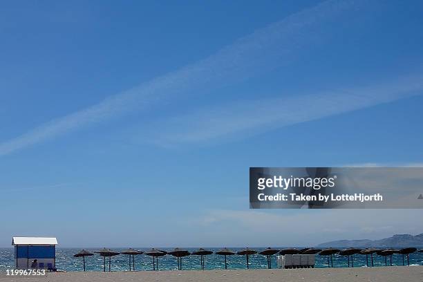 empty windy beach - salobreña stock pictures, royalty-free photos & images
