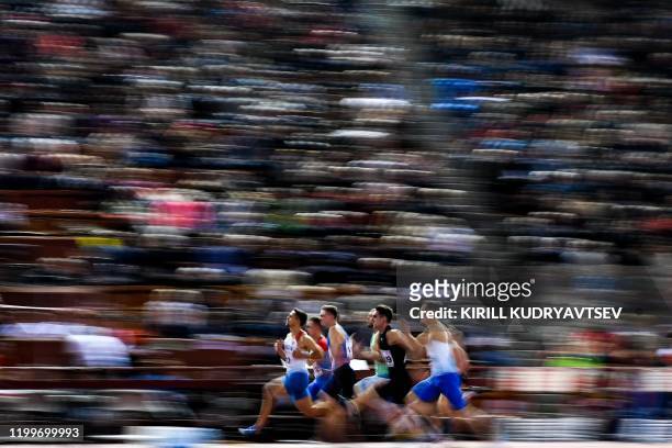 Russian athletes attend the 60m sprint event in the Russkaya Zima Athletics competition in Moscow on February 9, 2020. - The entire board of Russia's...