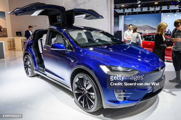 Tesla Model X 90D full electric luxury crossover SUV car on display at Brussels Expo on January 9, 2020 in Brussels, Belgium. The rear Falcon Wing...