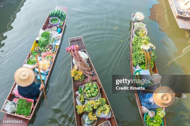 floating market - marché flottant photos et images de collection