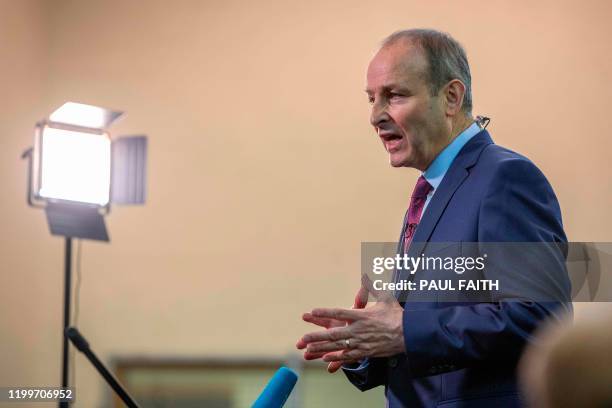 Leader of Ireland's Fianna Fail party, Micheal Martin gives an interview inside the count centre in Cork, where he is seeking to be re-elected in...