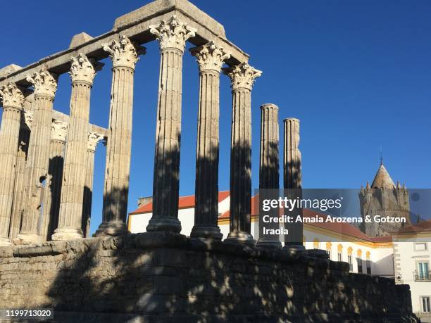 roman temple of évora. alentejo, portugal. - évora district stock-fotos und bilder