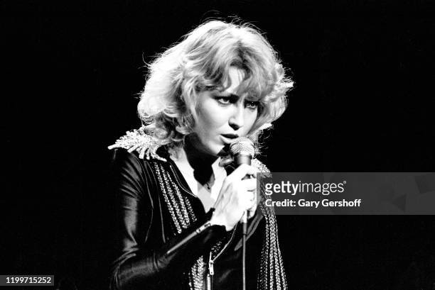 American Country musician Tanya Tucker performs onstage at the Bottom Line, New York, New York, December 13, 1987. Tucker was performing in support...