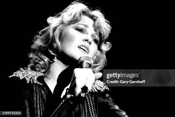 American Country musician Tanya Tucker performs onstage at the Bottom Line, New York, New York, December 13, 1987. Tucker was performing in support...