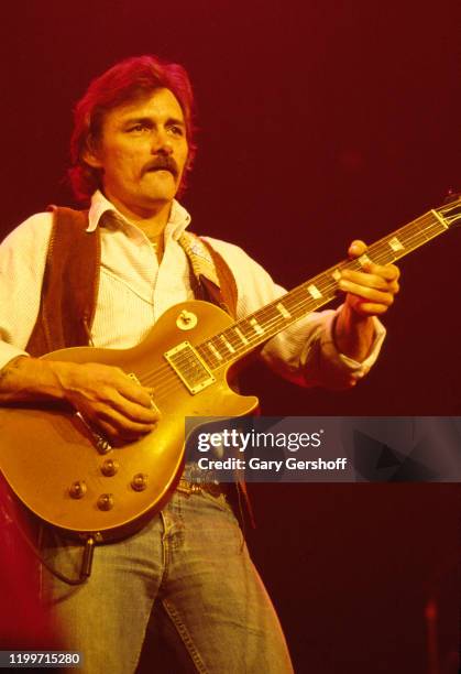 American Rock and Country musician Dickey Betts , of the Allman Brothers Band, plays guitar as he performs onstage at the Capitol Theatre, Passaic,...