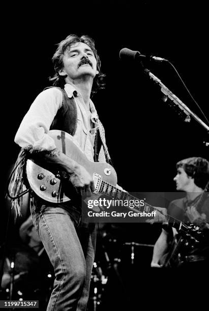 American Rock and Country musician Dickey Betts , of the Allman Brothers Band, plays guitar as he performs onstage at the Capitol Theatre, Passaic,...