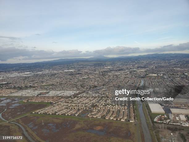 Heron Bay and neighborhoods are visible in an aerial view of the East Bay region of the San Francisco Bay area, San Leandro, California, January 8,...