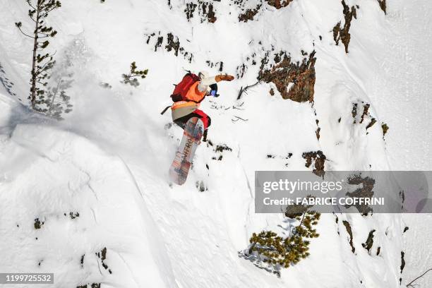 This image taken on February 7, 2020 shows freeride snowborder Elias Elhardt of Germany competing during the Men's snowboard event of the second...